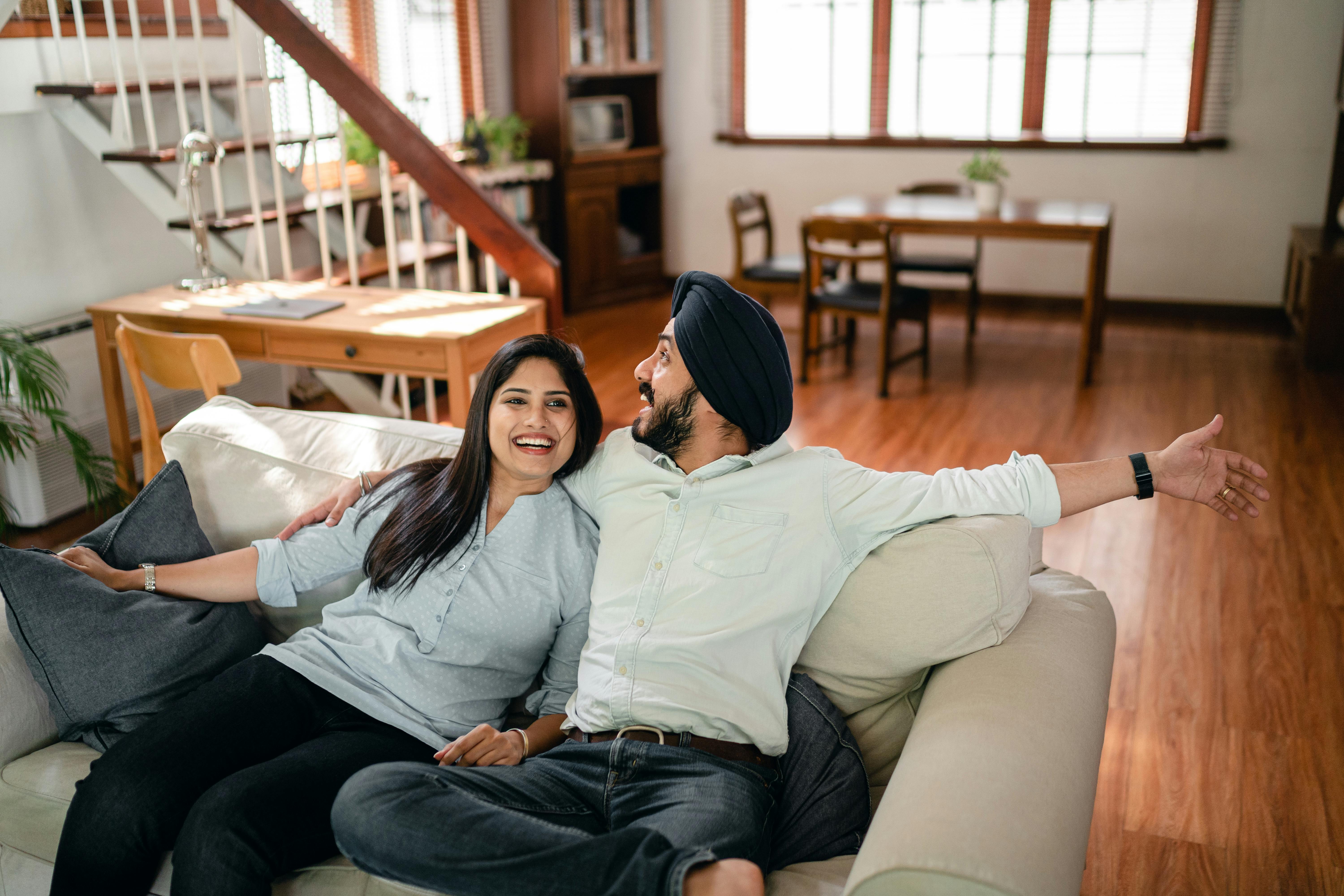 Happy couple looking for home loan